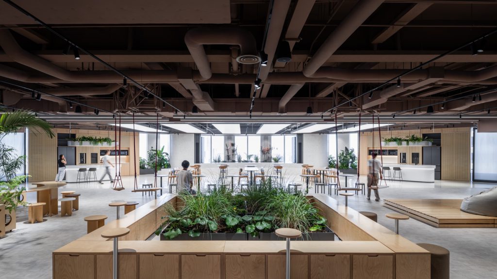 The Grand Pantry with its central planted island, hanging swings and tea kitchens to either side